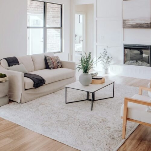 "Modern living room with elegant decor and natural light, representing home protection with Regal Insurance"